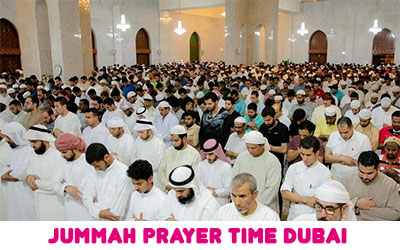 Muslims offering Jummah prayer with imam and on text write Jummah Prayer Time Dubai